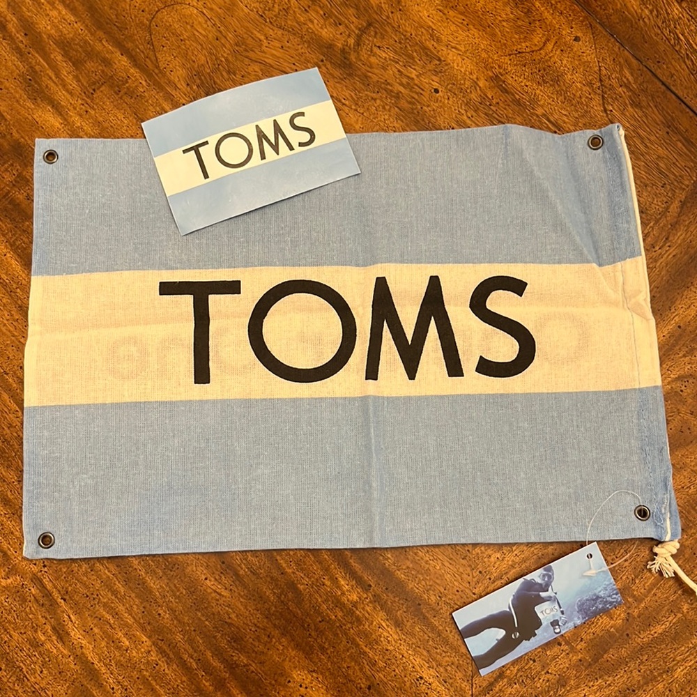 NWT TOMS Dust Cover Bag and Sticker